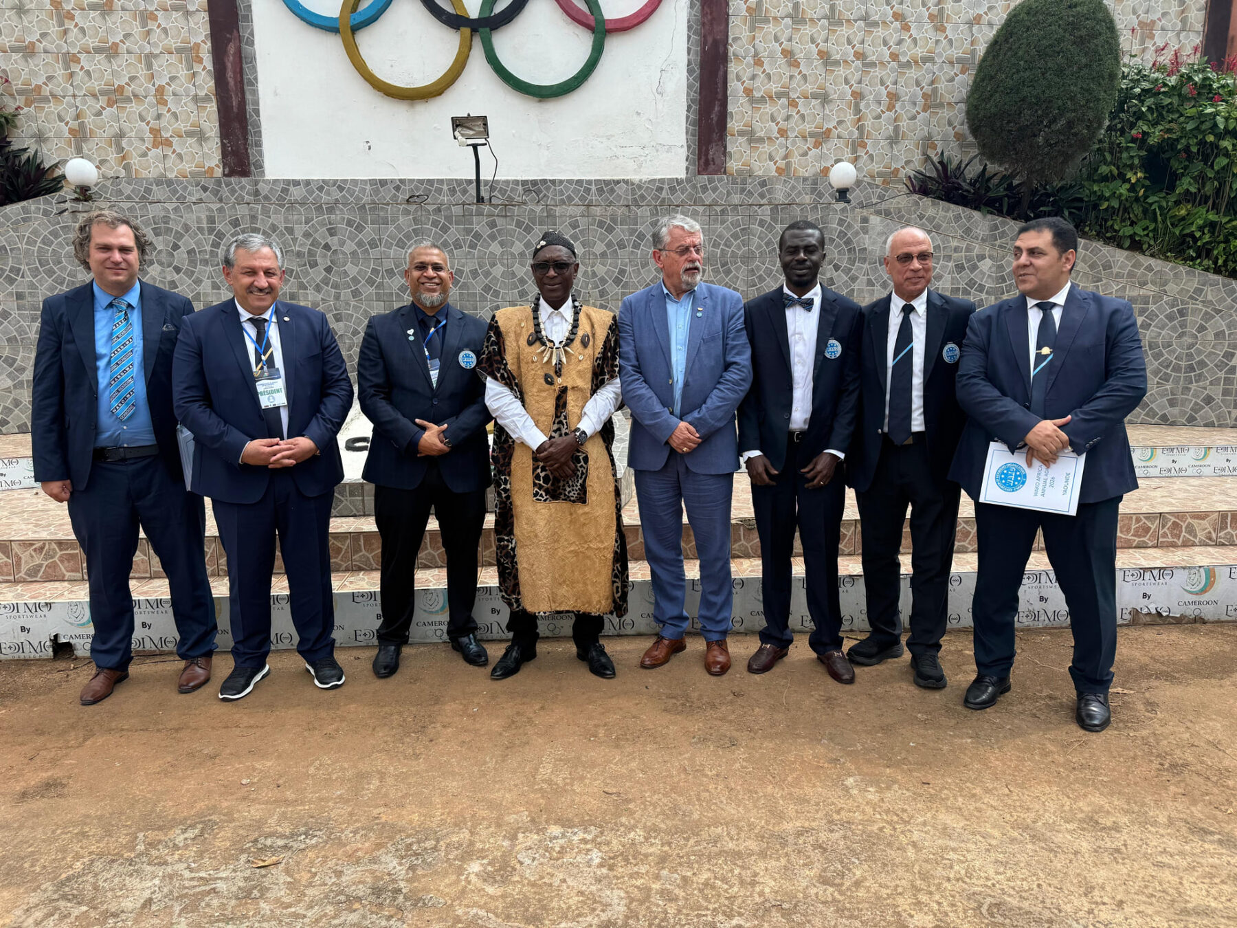 WAKO delegation in front of the Olympic rings