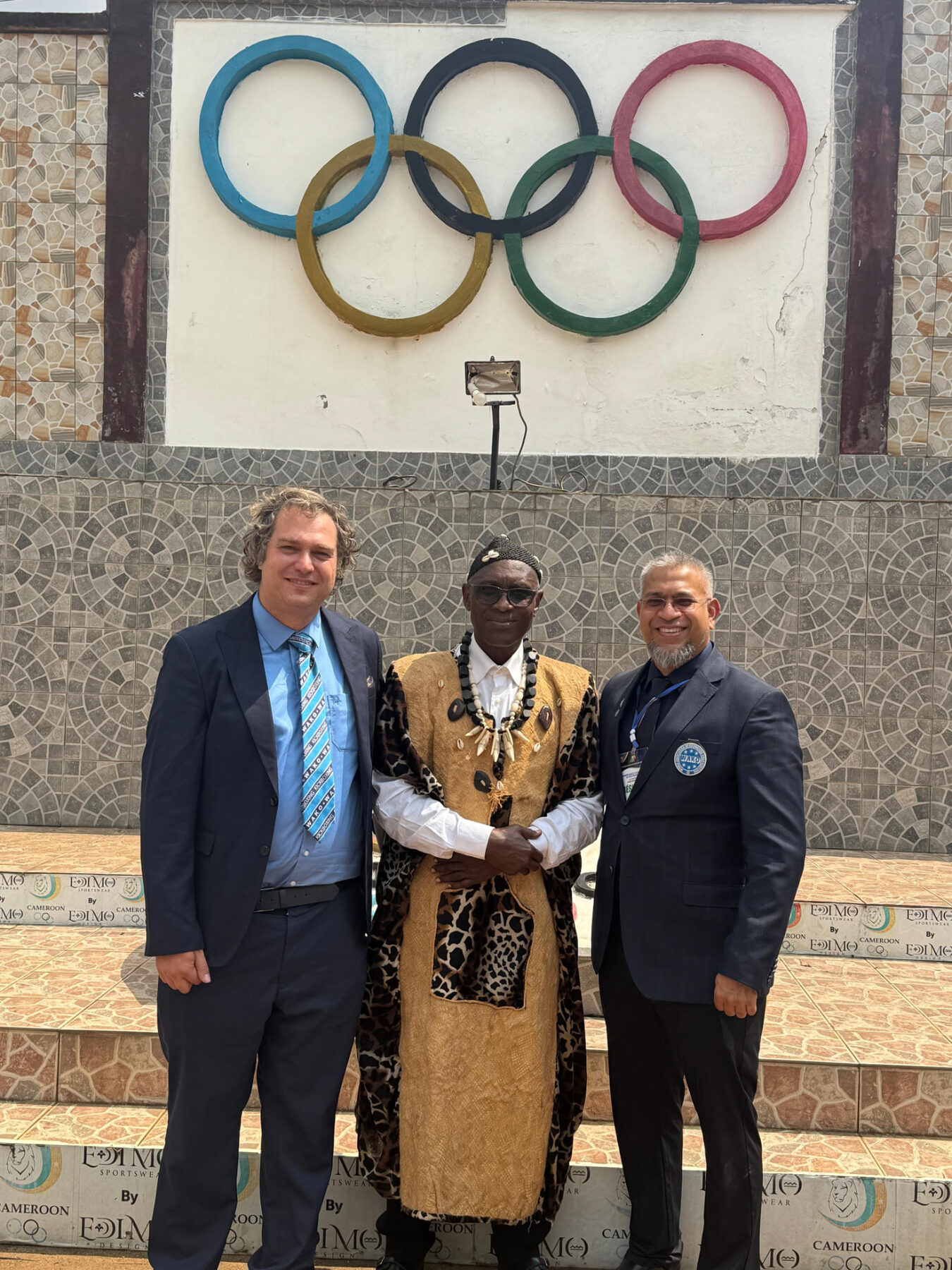 A WAKO Africa official congratulating an athlete